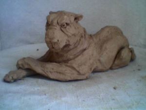 Sculpture de orla: lionne allongee