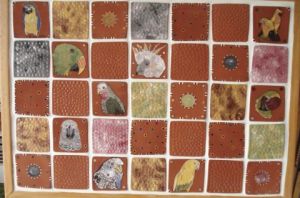 Oeuvre de valerie laugier: Carreaux monté en table basse motif perroquets