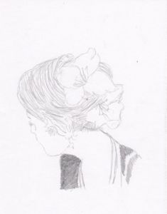 Dessin de kraknoux: Femme de profil avec fleurs dans les cheveux