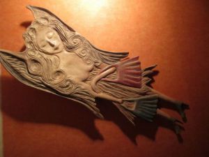 Sculpture de unicornis: ange faisant ses courses