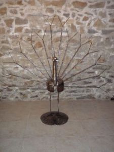 Sculpture de Roland GOURDON: Le Paon blanc