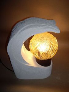 Sculpture de CARLITOS: flamme de l'ocean