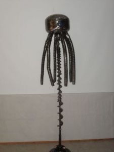 Sculpture de Roland GOURDON: PIEUVRE SUR ALGUE