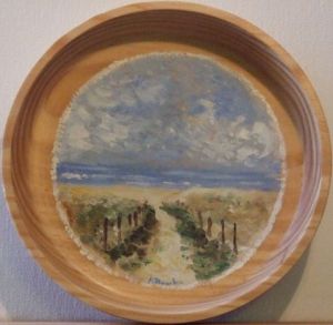 Oeuvre de kromka: peinture sur assiette bois tournée