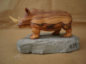 Sculpture de Clement MOUCHE: Rhinocéros (olivier)