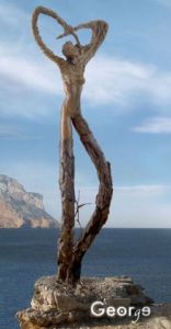 Sculpture de George: SAINT-ELME - Sur le sable du rivage a chaque trace de pas