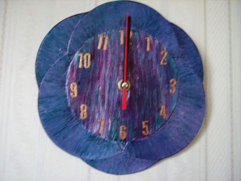 L'artiste olby - horloge bleue
