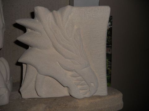 L'artiste jean-chrisophe yvon - dragon bas-relief