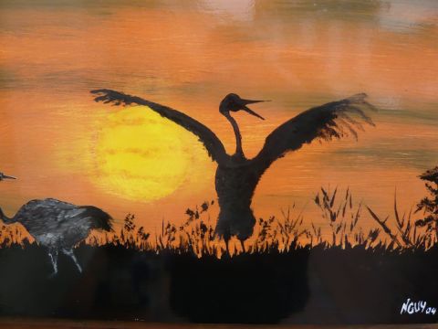 L'artiste gilbert nguyen thanh - les cigogne au coucher du soleil 