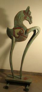 Sculpture de unicornis: sculpture sur bois chene peinte et patinée